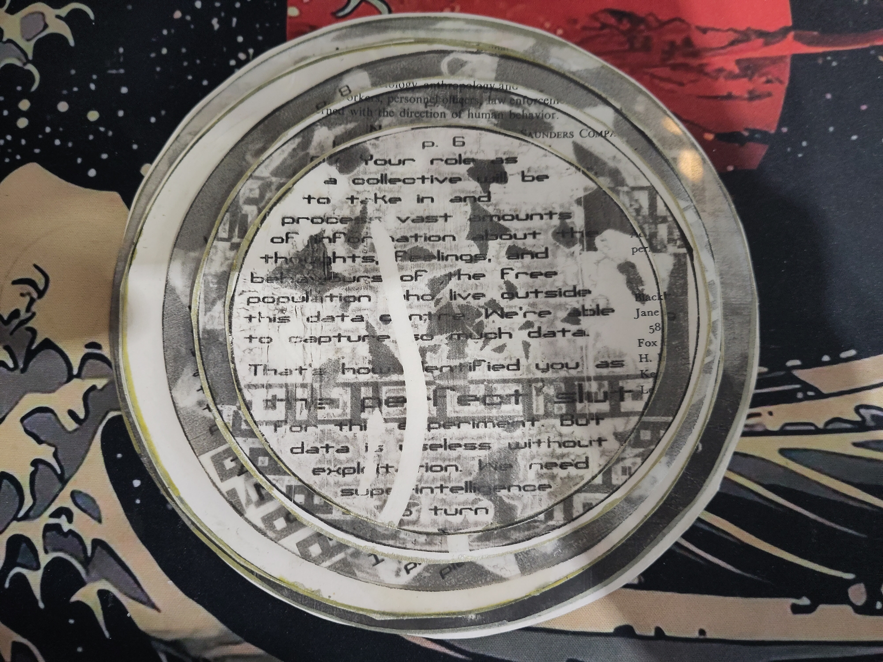 Concentric circles of acetate printed with digital collage, layered with original pages from an old book (the first Kinsey report!)